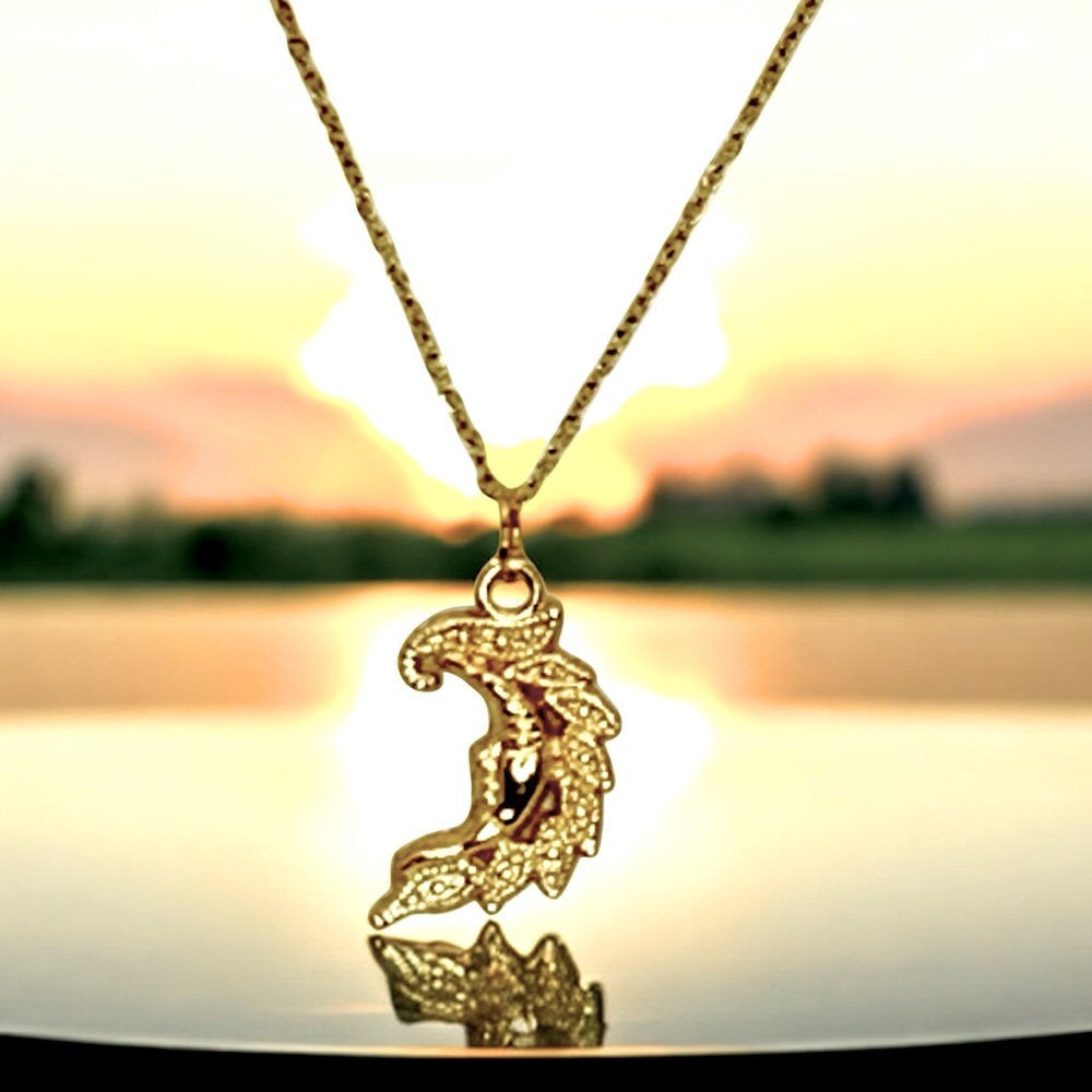 Gold Crescent Moon Necklace with a intricate Design